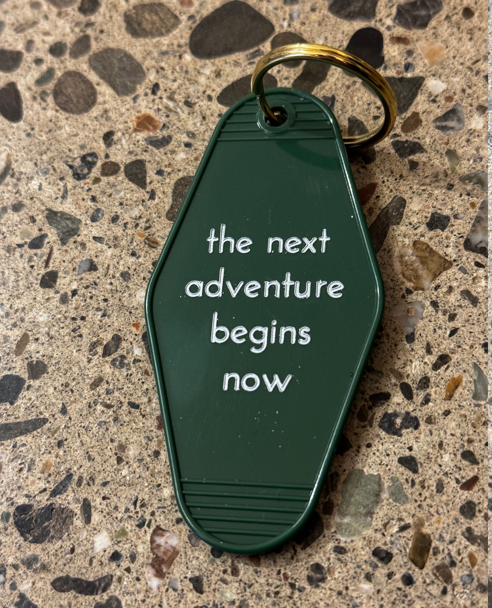 The Next Adventure Begins Now Keychain